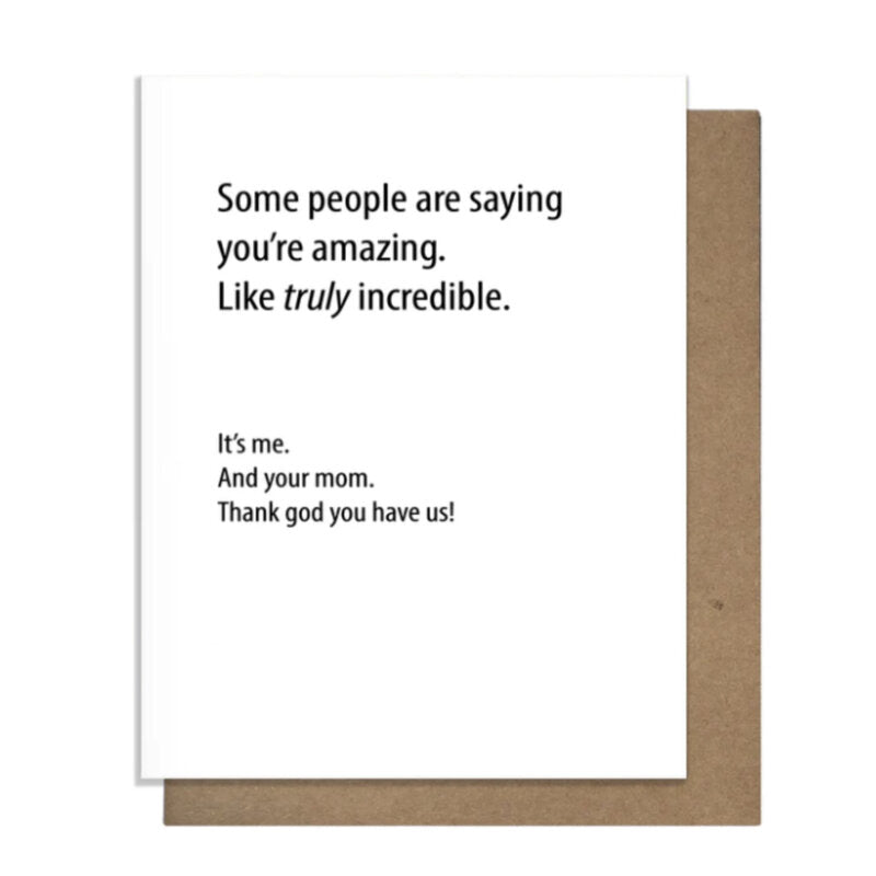 A greeting card with a white background and black text, accompanied by a brown kraft envelope. The text humorously thanks the recipient for being amazing, suggesting it's from both them and their mom.